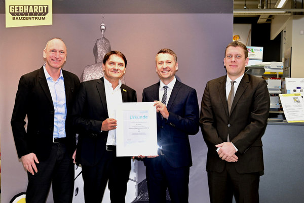Creditreform Würzburg Urkundenübergabe 50 Jahre Gebhardt Bauzentrum